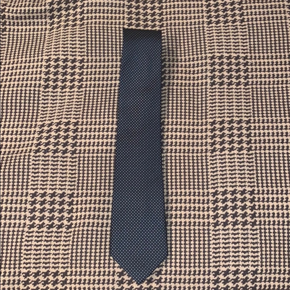 Black and white polka dot tie